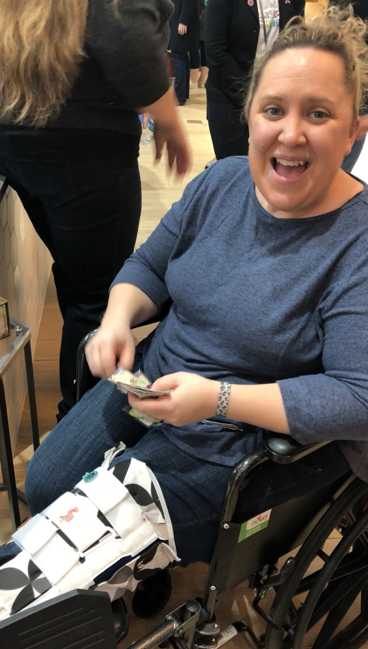 Jen having her cast bejeweled